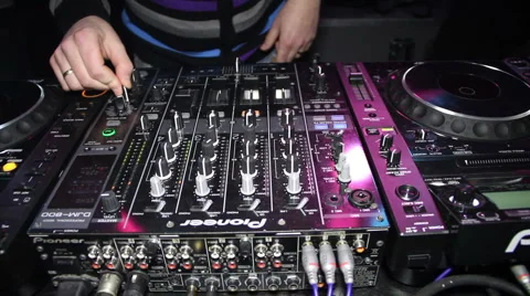 DJ working using a mixer Stock Footage 2887405