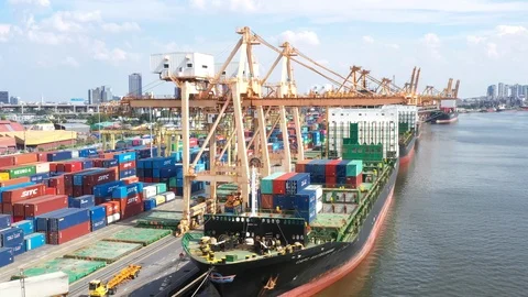 DJI 0018 Loading containers to transportation sea boat in port Stock Footage 123939181