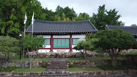 DJI 0073 Drone Flying Toward Traditional Korean Hanok House Stock Footage 336651869