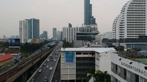 DJI Cloudy Bangkok slow move over the Freeway Stock-Footage 101109705