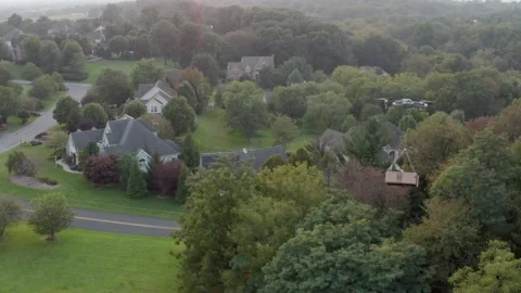 DJI drone delivery of Amazon package to residential homes in USA. Stock Footage 164213256