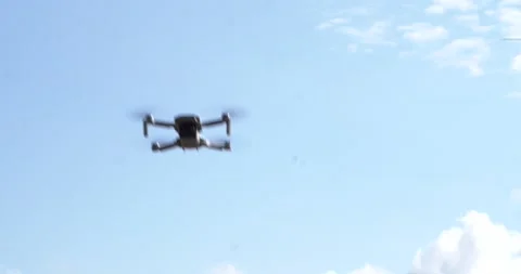 DJI Drone flying by Stock Footage 196911298