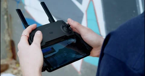 DJI Drone Remote Video stock 155053843