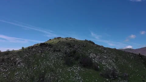 DJI flight to the rocky summit Stock-Footage 248692363