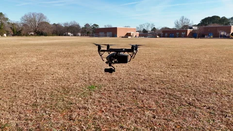 DJI Inspire 2 Hovering in Flight Filmed by Orbiting Drone 库存影片 325523170