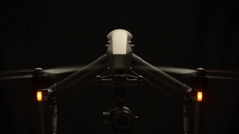 DJI Inspire 2 with props rotating against a black background Stock Footage