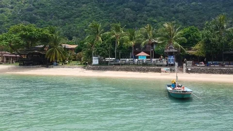 DJI Koh Phangan Fly over Boat towards beach over ocean Stock-Footage 101109723