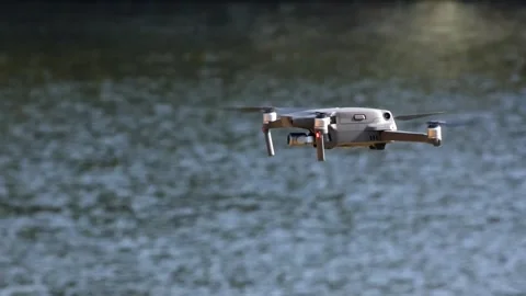 DJI Mavic 2 Pro Circling Over Water Surface Stock Footage 322151152