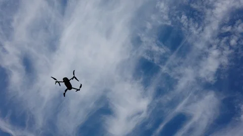 DJI Mavic 2 Zoom in front of Blue Sky 스톡 동영상 113004868