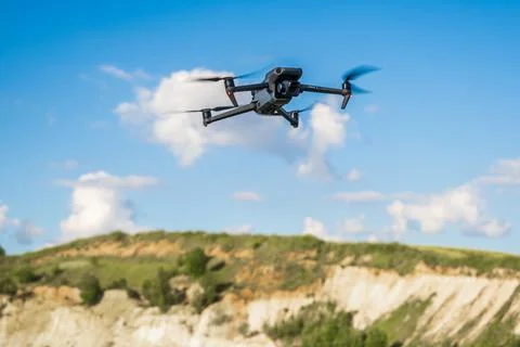 DJI Mavic 3 drone on gray or sky background Stock Photos