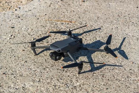 DJI Mavic 3 drone on gray or sky background Stock Photos