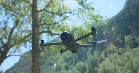 DJI Mavic 4 Pro quadcopter drone hovering in forest. Close-up Vídeos de archivo 339107468
