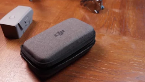 DJI Mavic Air 2 - 3-quarters overhead push in shot on dining room table Stock Footage 138218941