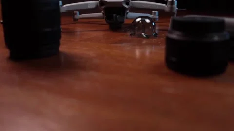 DJI Mavic Air 2 - Push in to front of aerial drone on dining room table Stock Footage 138528655