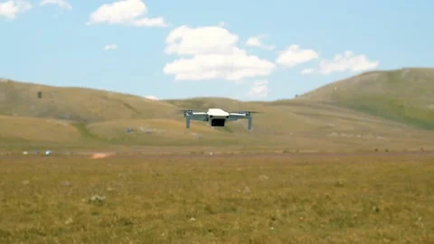 DJI Mavic Mini gain altitude and flight over sky  Stock Footage 149888199