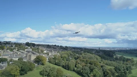 DJI Mavic Pro 2 drone in distance flying against blue sky Video stock 103679778