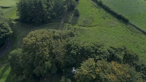 DJI Mavic Pro 2 drone hovering over fields with Phantom flying around it Video stock 103682389