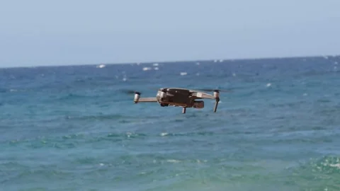 DJI Mavic Pro 2 Drone Flying Over Tropical Water Lowers Out of Frame 4k 60fp Stock Footage 154649898