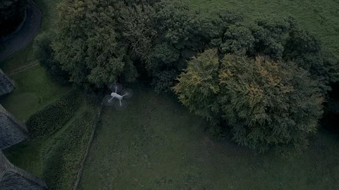 DJI Mavic Pro 2 hovering over viaduct with drone flying around it Video stock 103683272