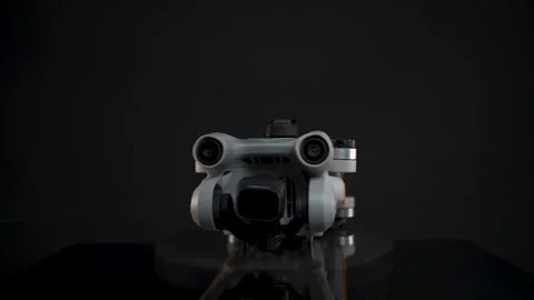 DJI Mini 3 Pro - Folded - Spinning Side-On - Fixed Focus - Black Background 動画素材 255208298