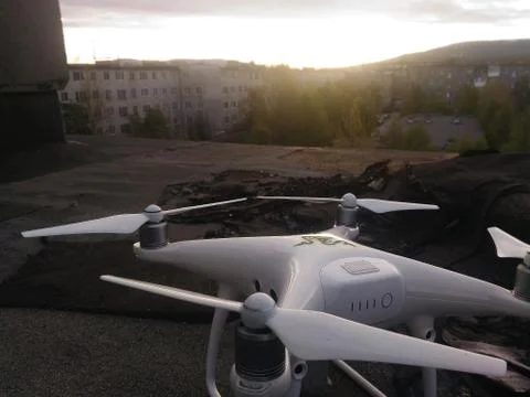 DJI Phantom 4 Pro Drone Found on the Roof of the Building Stock Photos