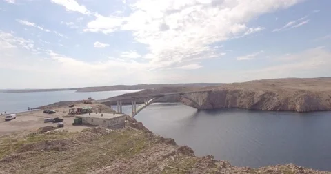 Dji phantom 4k drone flying above bridge at summer Stock Footage 54196413
