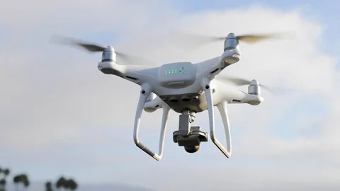 DJI Phantom Drone in Flight Aerial Photography Videography Stock Footage 127015444
