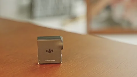 DJI RS 5 Tracking Module on Modern Office Counter in bright studio. medium Stock Footage 331974655