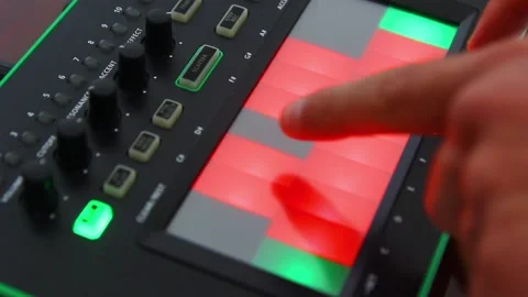 DJ's hand adjusts the control panel Stock Footage 241565813