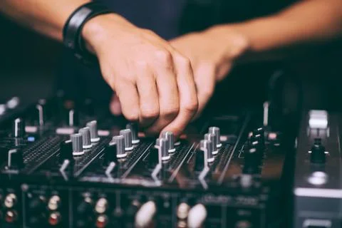 DJ's hands control the remote control close-up Stock-Fotos