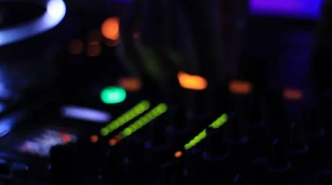 DJ's hands operating sound mixer Stock Footage 40428831