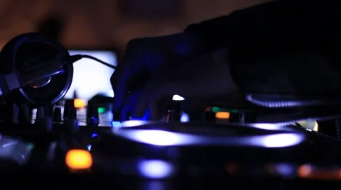 DJ's hands operating sound mixer Stock Footage 40429146