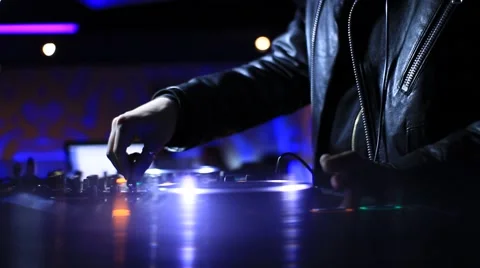 DJ's hands operating sound mixer Stock Footage 40429498
