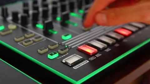 DJ's hands play on the remote, moving the sliders Stock Footage 247145006