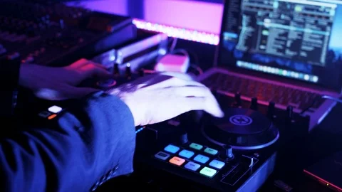 DJ's Hands While He Uses DJ Mixer Stock Footage 71812510