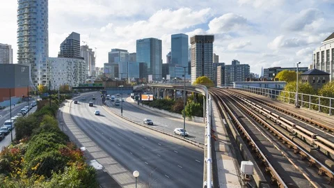 DLR train approaching East India station. The Docklands Light Railway, Car Stock Footage 107422339