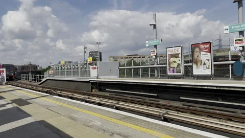 DLR Train Arriving At Royal Albert Station Video stock 218636190