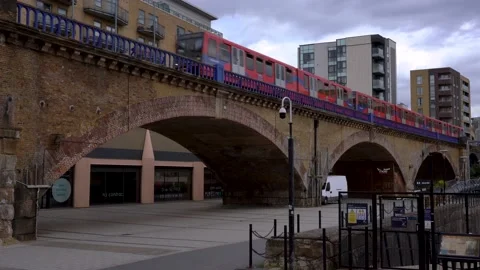 DLR Train driving through Limehouse Stock Footage 153337433