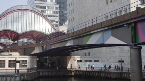 DLR Train over bridge, Canary Wharf, London Video stock 74056965