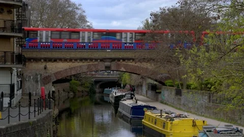 DLR Train passing over Limehouse Cut Video stock 153337296