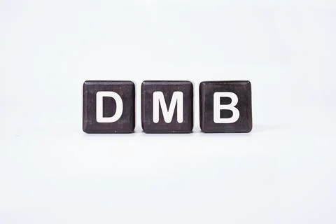 DMB text on cubes on a white background. Stock Photos