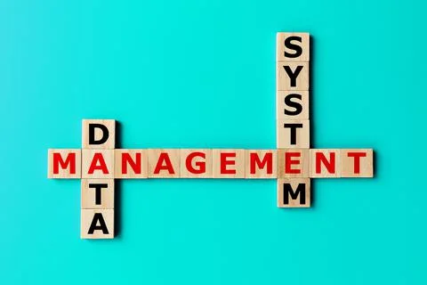 DMS, data management system crossword concept Stock Photos