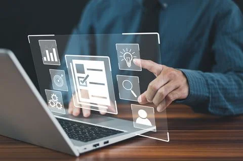DMS is document management concept, Man using a computer to document manage.. Stock Photos