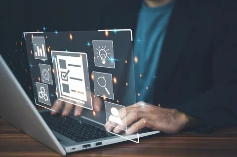 DMS is document management concept, Man using a computer to document manage.. Stock Photos