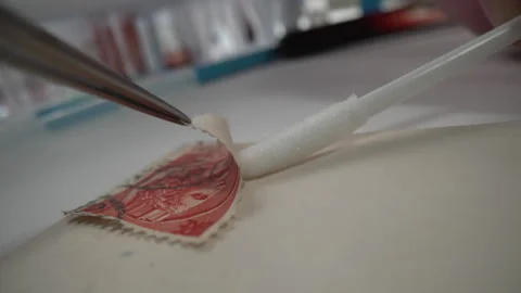 DNA sample taken from stamp Stock Footage 272149903