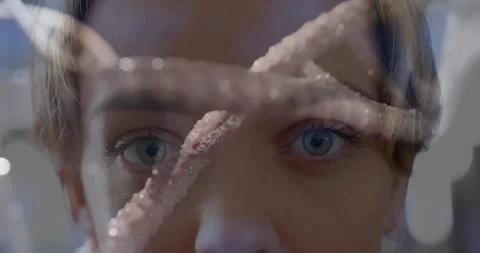 DNA strand animation over close-up of person face with blue eyes Stock Footage 303461440