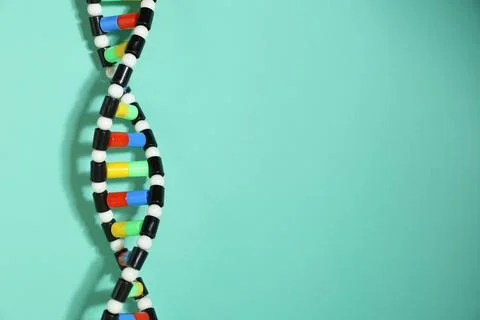 DNA structure model on turquoise background, space for text Stock Photos