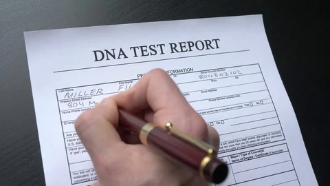 DNA Test Report Form Being Filled By a Hand Stock Footage 76747668
