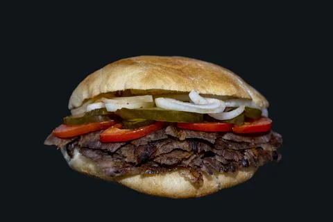 Dner sandwich lamb or beef  meat called Sandvi dner isolated on a Black backg Stock Photos