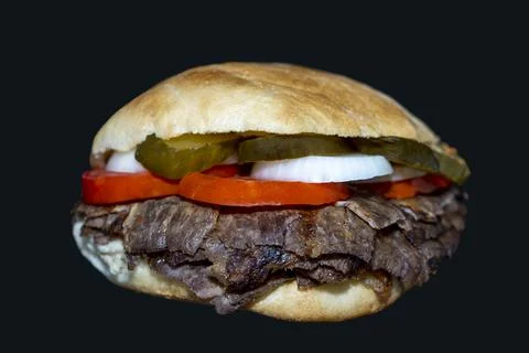 Dner sandwich lamb or beef  meat called Sandvi dner isolated on a Black backg Stock Photos